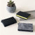 Grey and Black Leather Secrid Wallets with RFID protection available at boogie + birdie in Ottawa