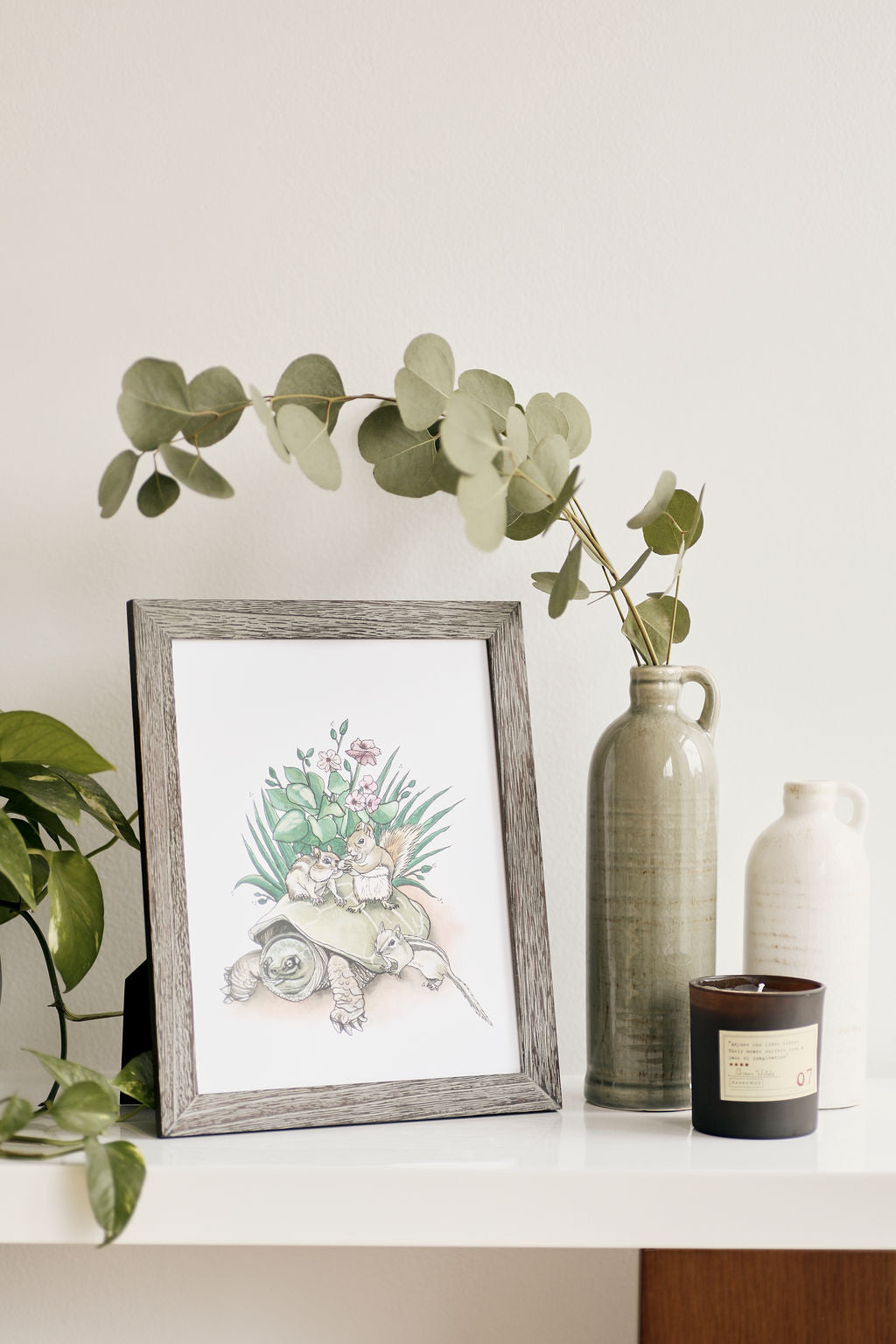 Shop Art Prints from Canadian artists at boogie + birdie in Ottawa. Framed Kelly Dixon watercolour art print with turtle and group of chipmunks on its back.