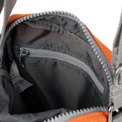 Atomic Orange Bond Pocket Crossbody Bag | Ori London | boogie + birdie