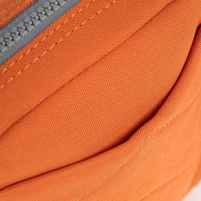 Atomic Orange Bond Pocket Crossbody Bag | Ori London | boogie + birdie