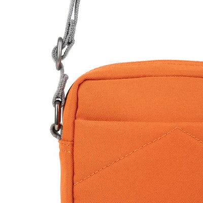 Atomic Orange Bond Pocket Crossbody Bag | Ori London | boogie + birdie
