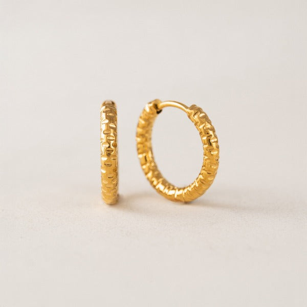 Gold hoop earrings on a light gray background Gold Brit Waterproof Hoops | Lover's Tempo | boogie + birdie