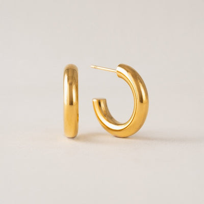 Gold hoop earrings on a light gray background | Gold Friday Waterproof Hoop Earrings | Lover's Tempo | boogie + birdie