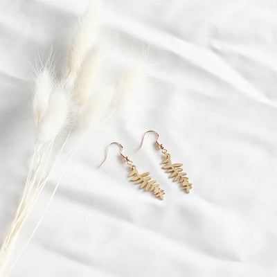 Gold Fern Leaf Drop Earrings | Shop Birch Jewellery at boogie + birdie in Ottawa.