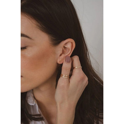 Gold Open Fire Curved Bar Studs | Shop jewellery at boogie + birdie in Ottawa.